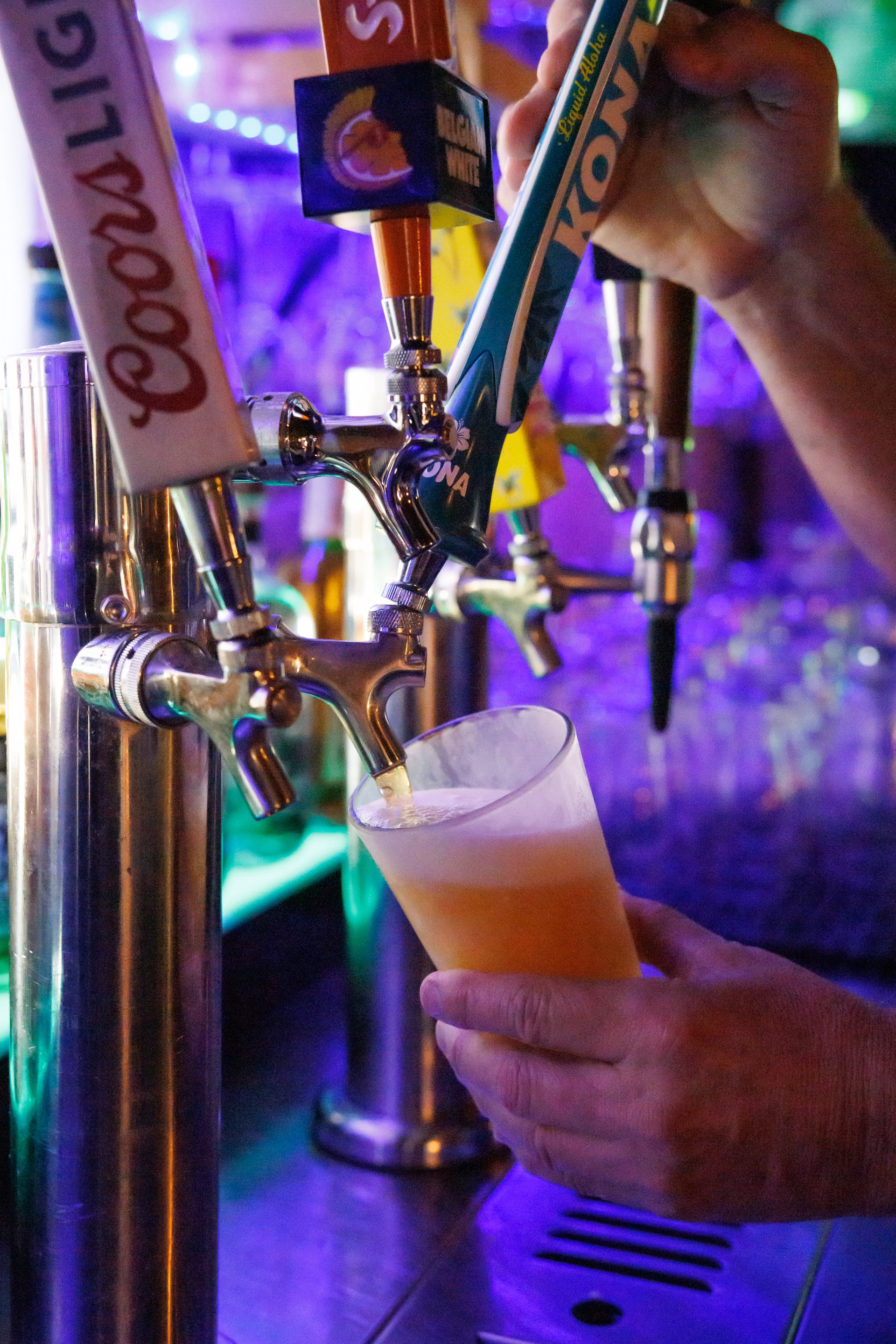 Draft beer pour at The Locals Pub bar